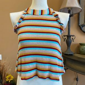 An altarid state ruffle top